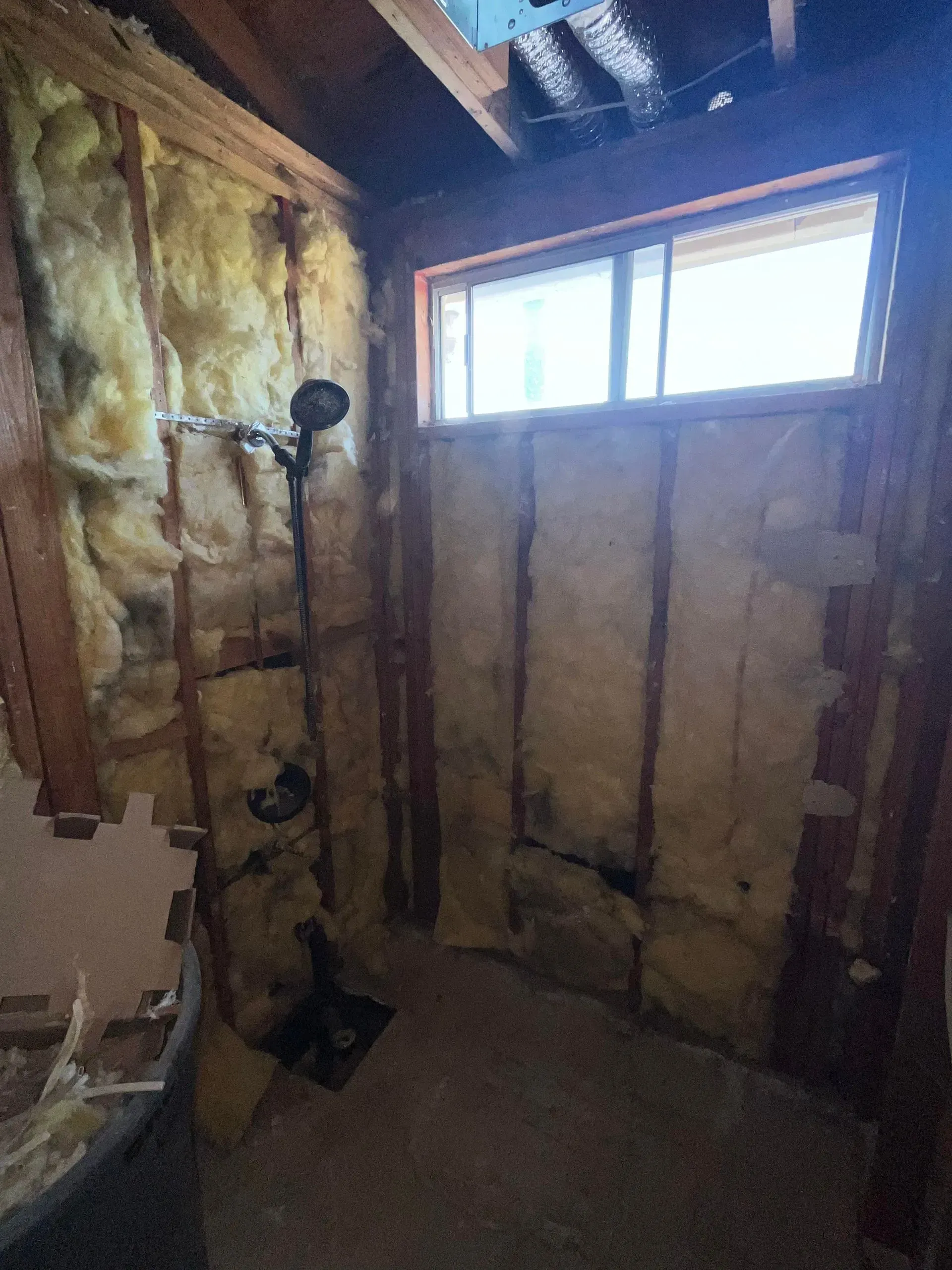 A room with a lot of insulation and a window