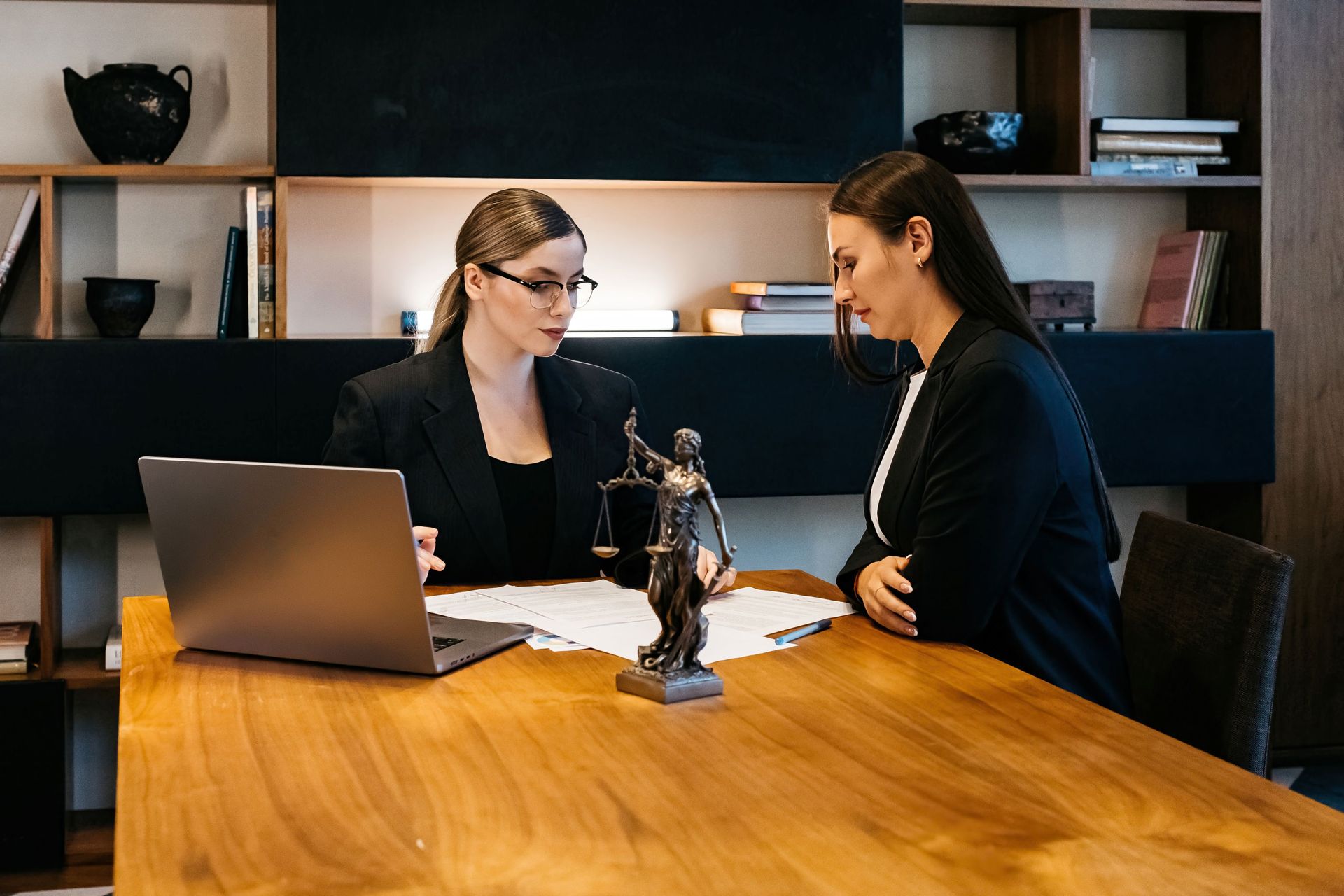Two Women in a Law Office, Reviewing Documents — Trapski Family Law in Williams Landing, VIC