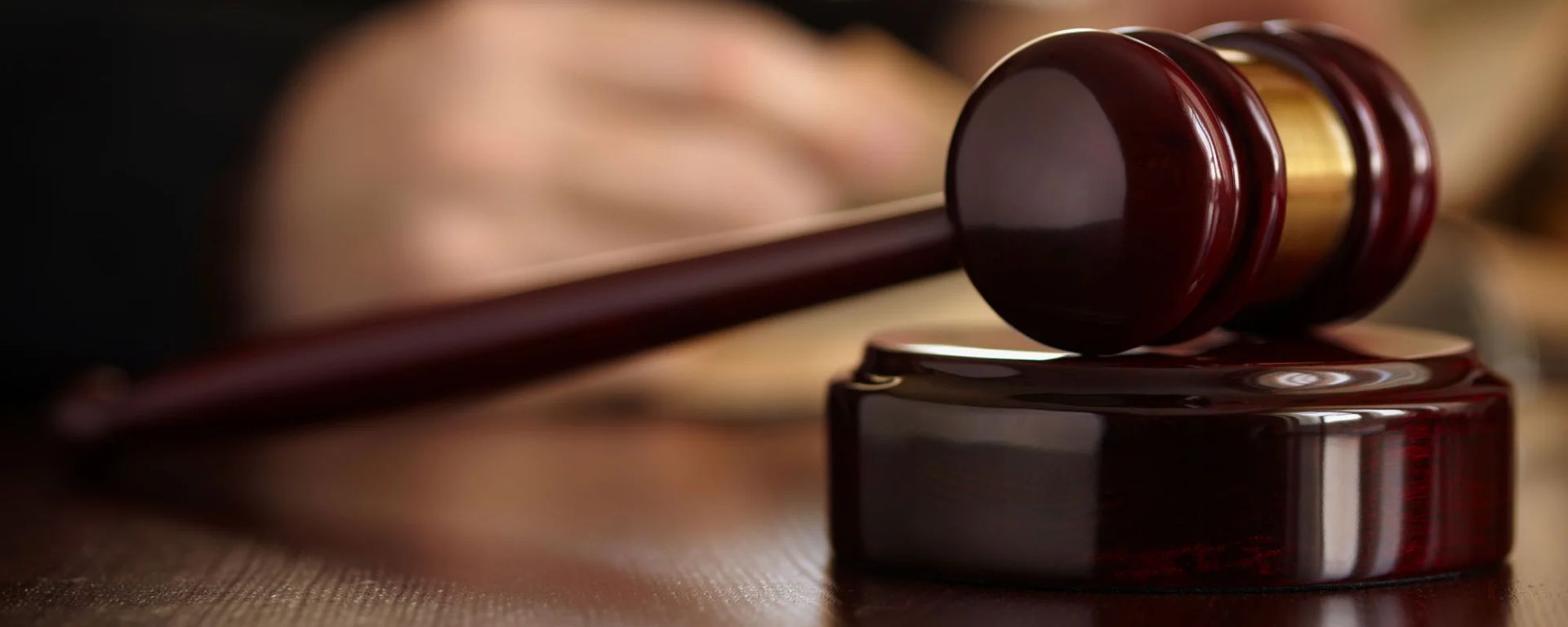 Close-up of a Gavel Resting on Its Block, on a Wooden Surface — Trapski Family Law in Geelong, VIC