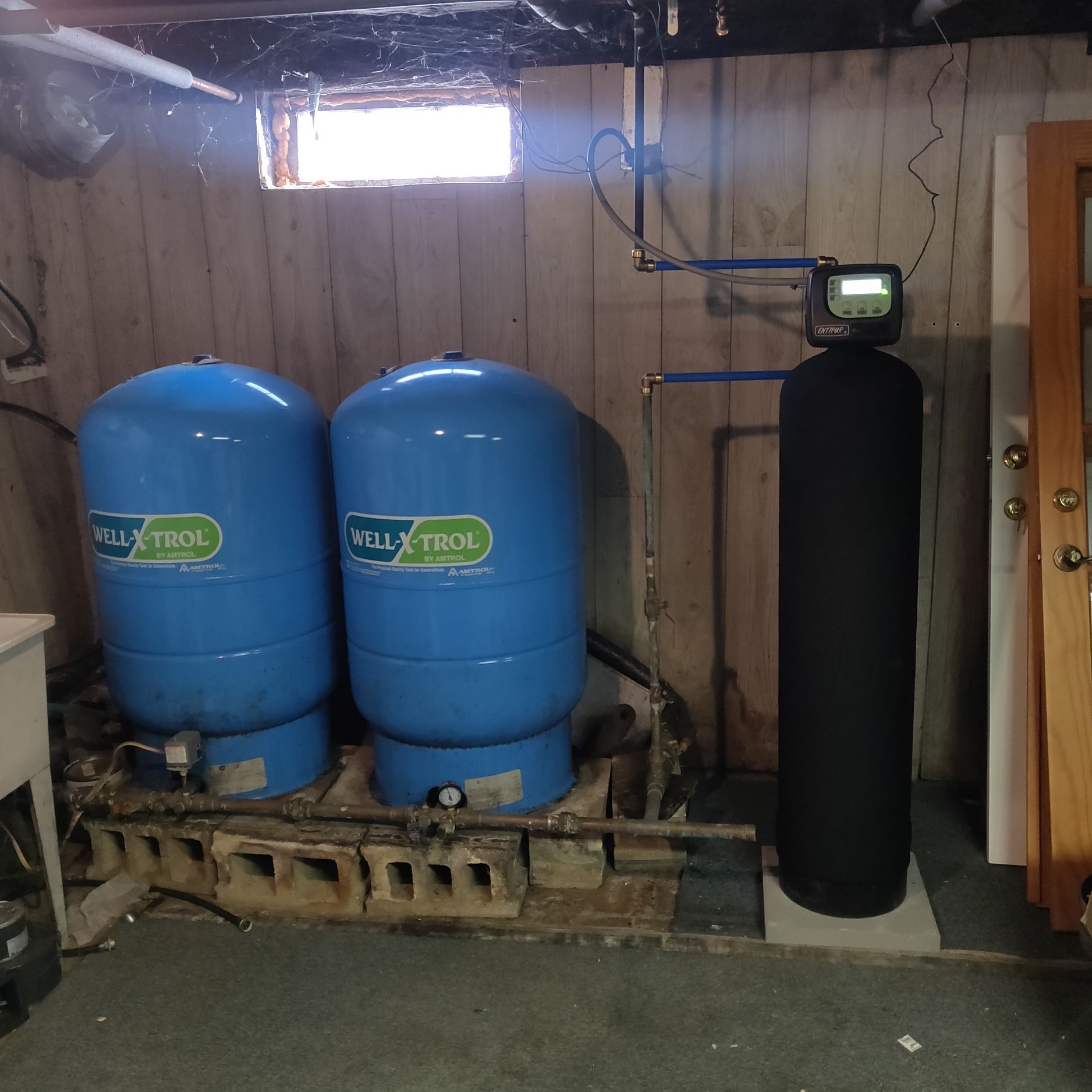 Two blue tanks with the word will on them