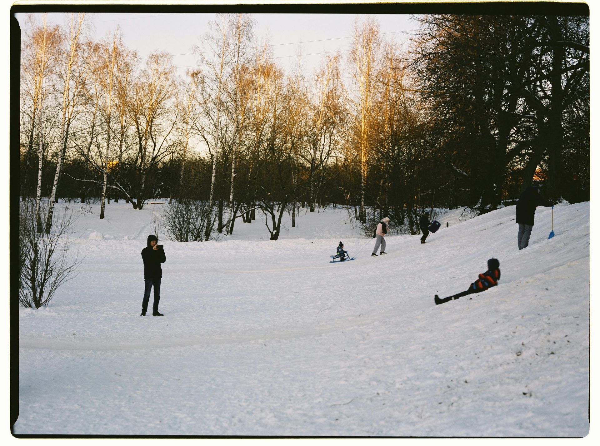 children playing outdoor in the snow