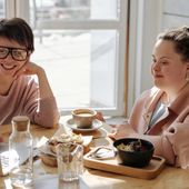 A carer with a developmentally disabled lady spending time together