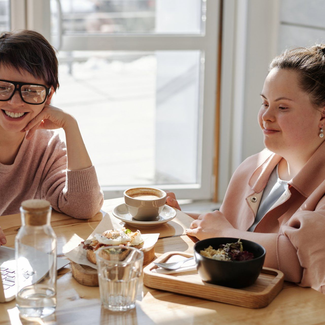 A carer with a developmentally disabled lady spending time together