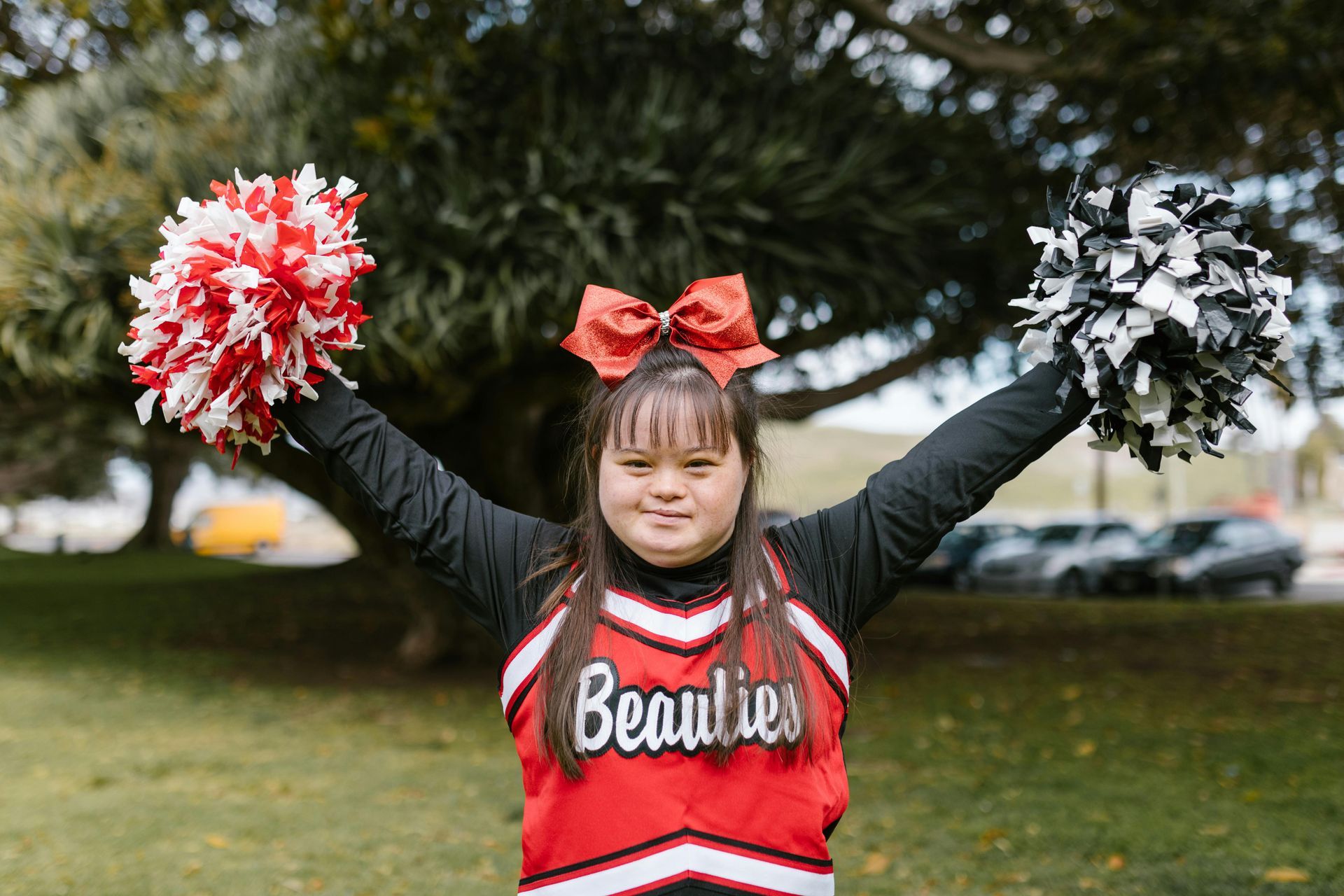 a cheer leader with developmental disability