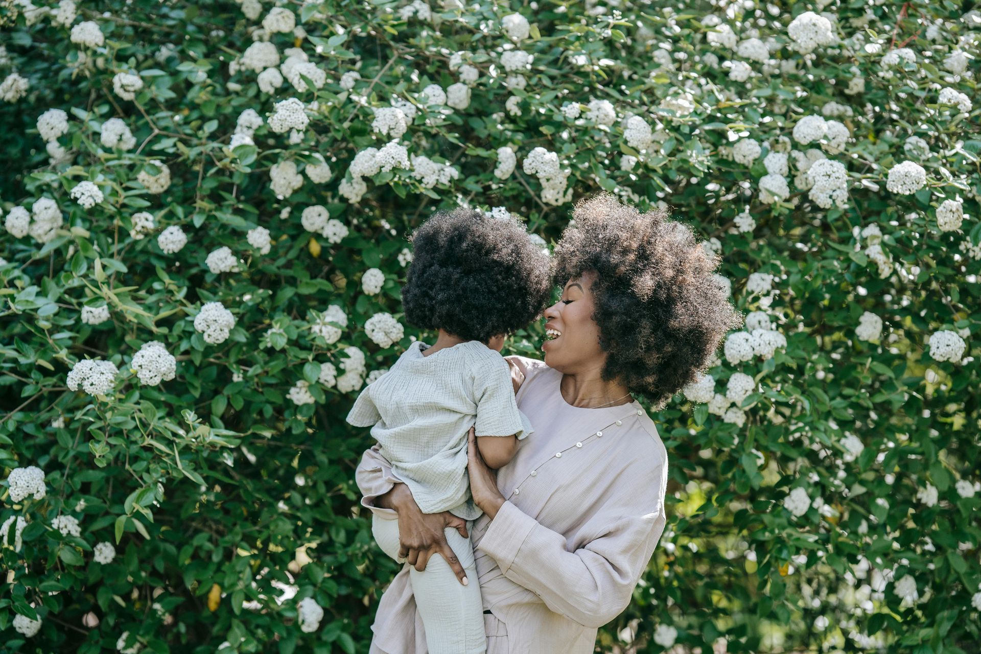 A mother and child happy together