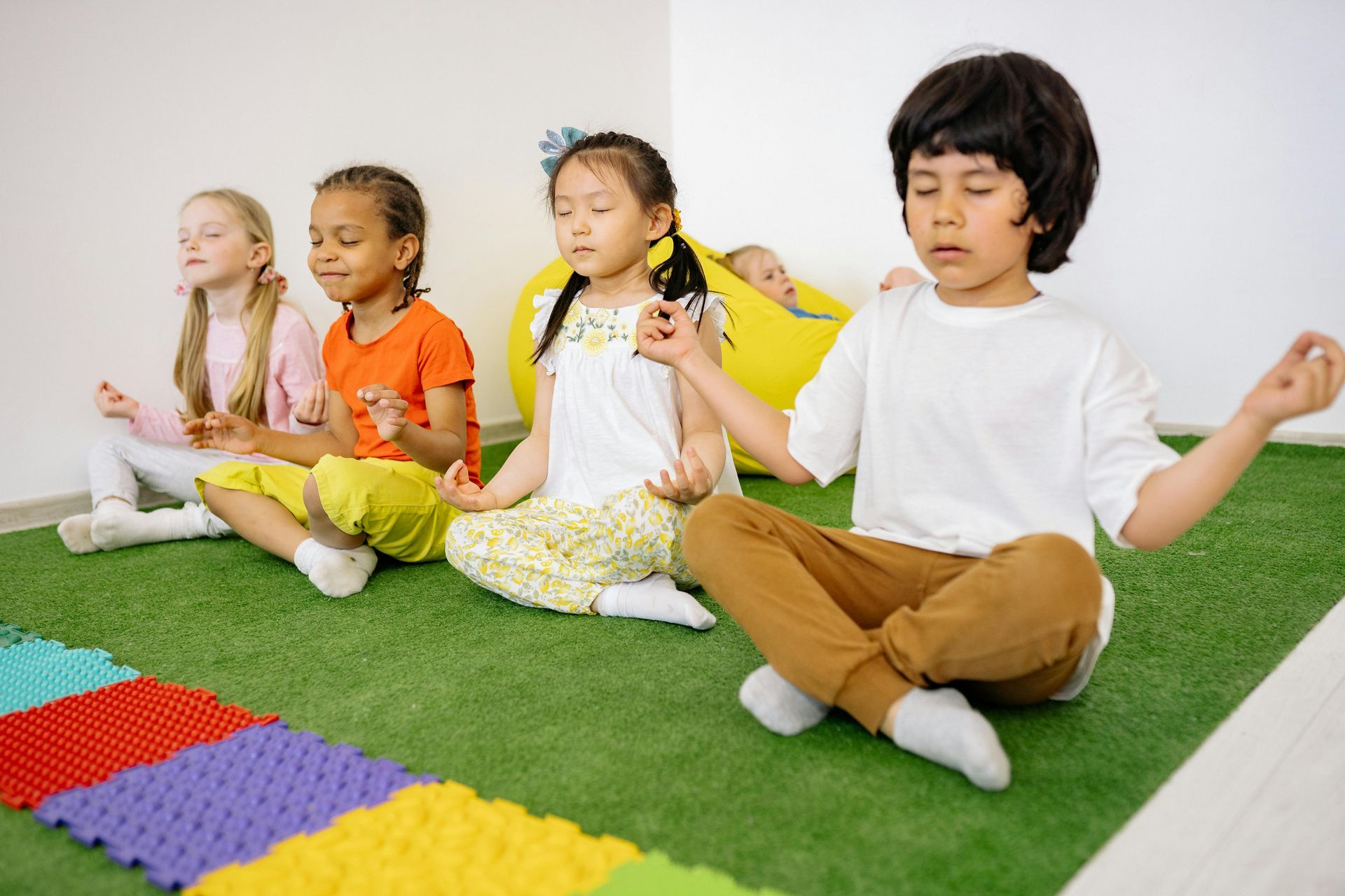 Children in a meditation session for improving mental health