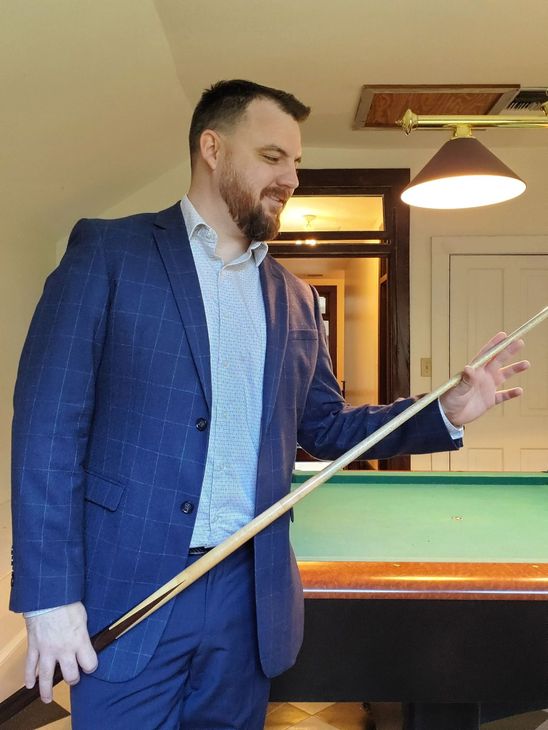 Kerry playing pool at a new listing