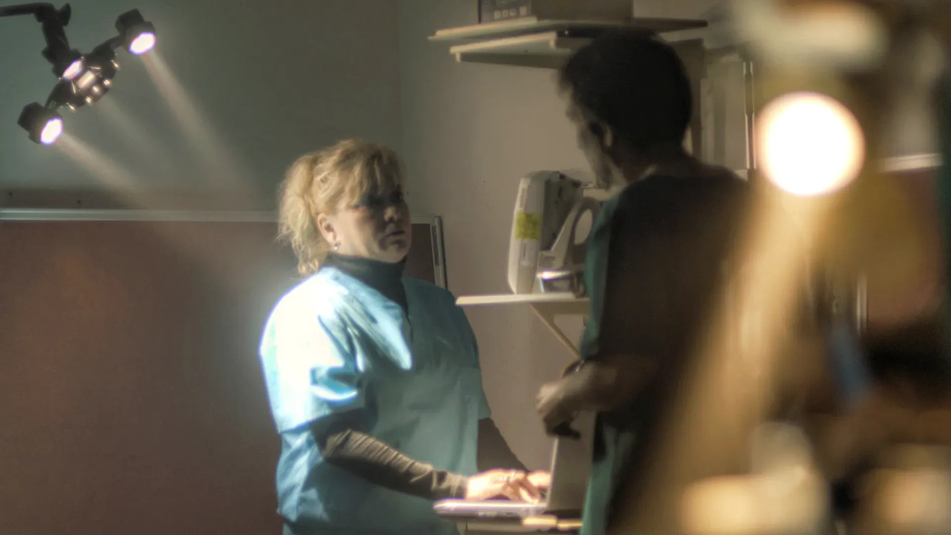 nurse and doctor talking
