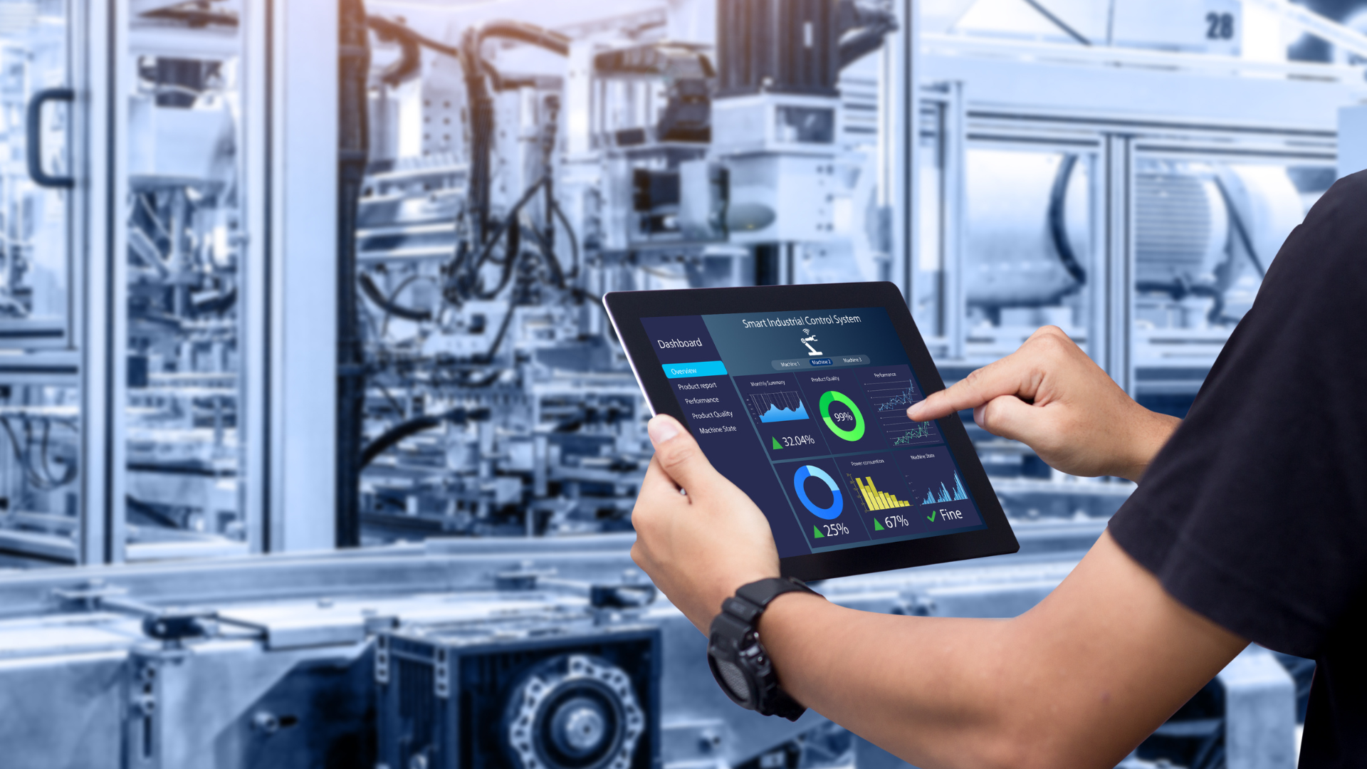 A man is holding a tablet in front of a machine in a factory.