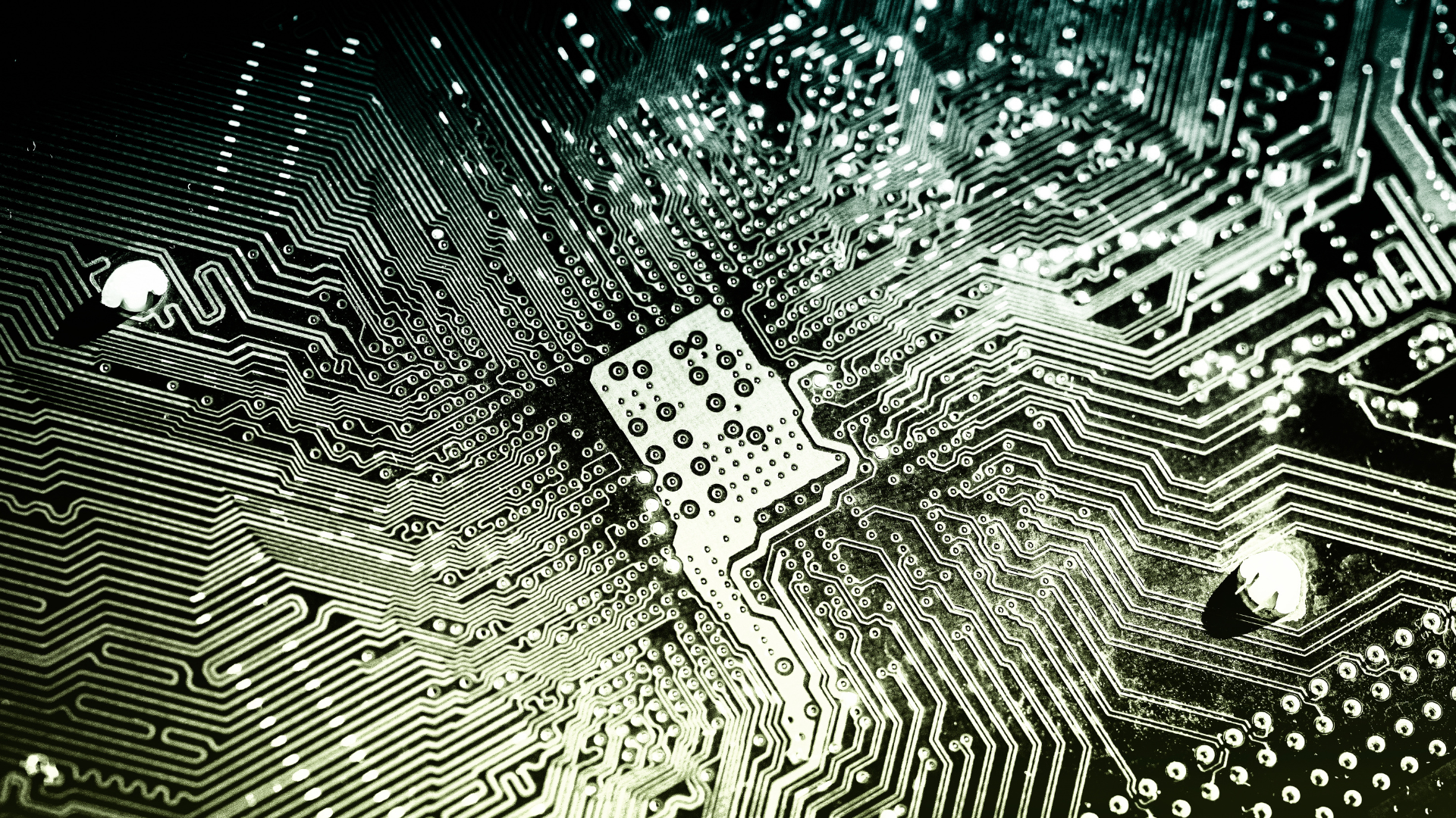 A close up of a computer motherboard with a key on it.