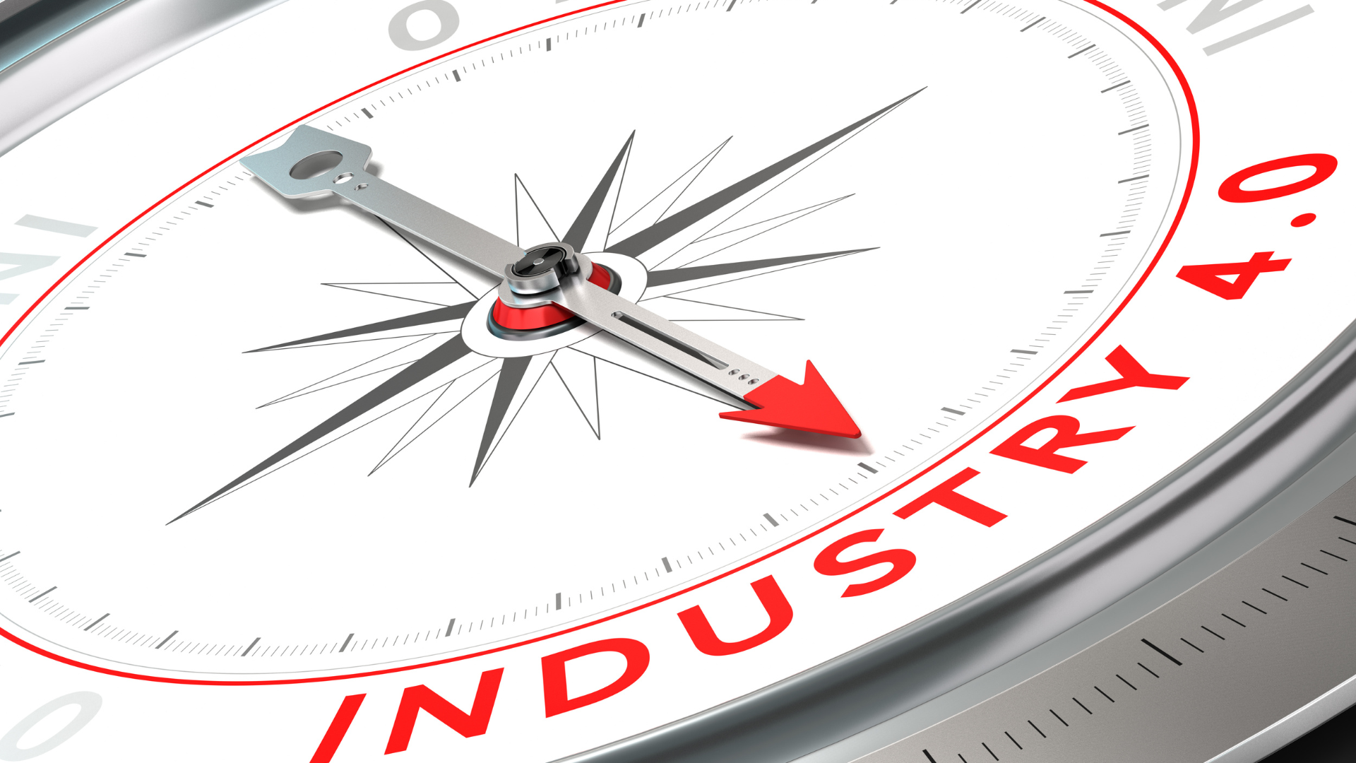 A compass with a red arrow pointing to the word industry 4.0.