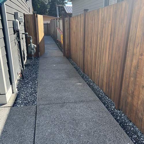 Yard With Wooden fence — Lakewood, WA — DOVE LANDSCAPING
