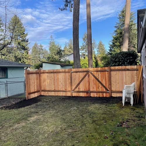 Wooden fence — Lakewood, WA — DOVE LANDSCAPING