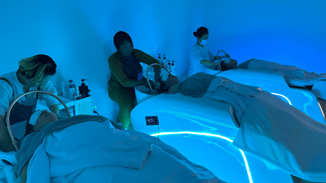 A group of people are getting a massage in a spa.