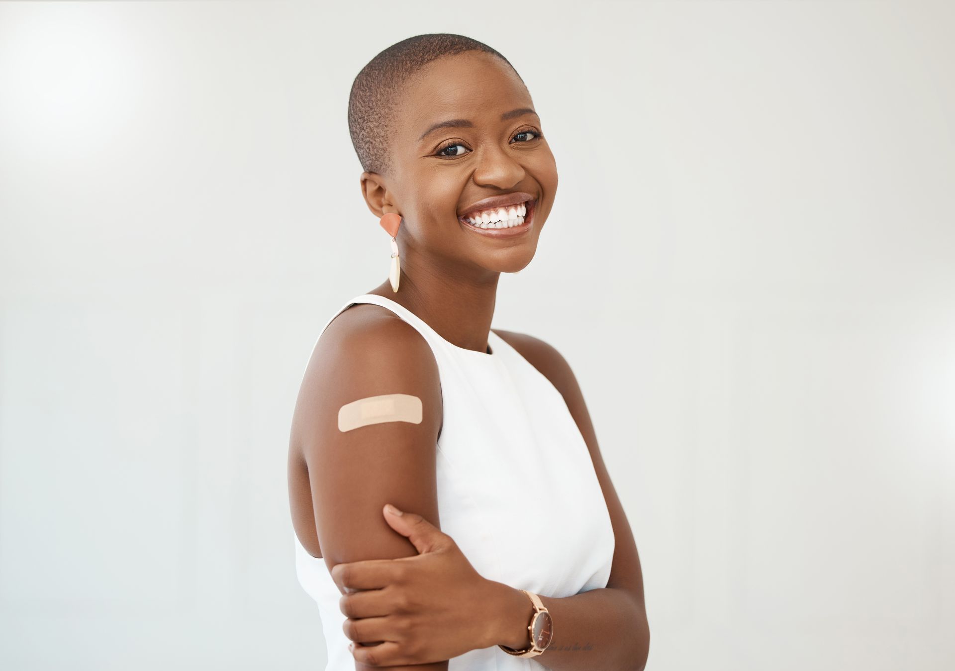 A girl with bandage on the arm