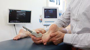 Diabetic Foot Care — Checking Ultrasound of a Foot in Sterling Heights, MI
