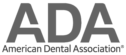 The logo for the american dental association is black and white.