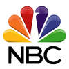 A nbc logo with a rainbow colored sunflower on a white background.