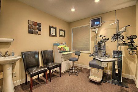 Room with Eye Checkup Equipment — Lancaster, OH — Price Family Eye Care Professionals