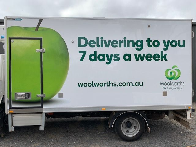 A truck that says delivering to you 7 days a week
