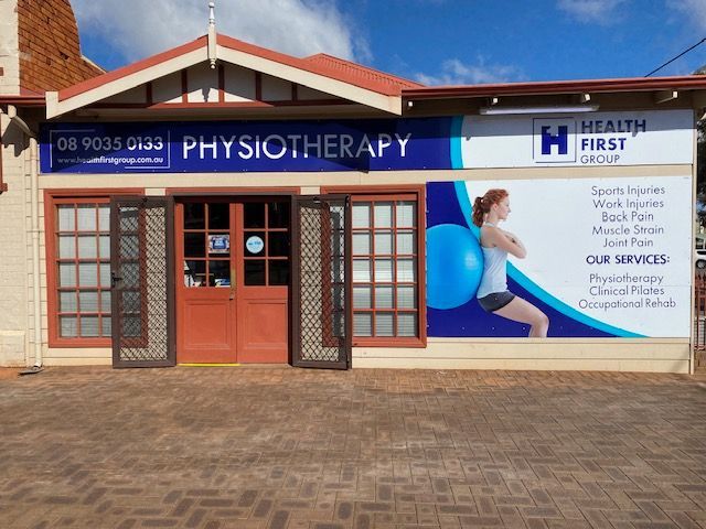 A building with a sign that says physiotherapy on it
