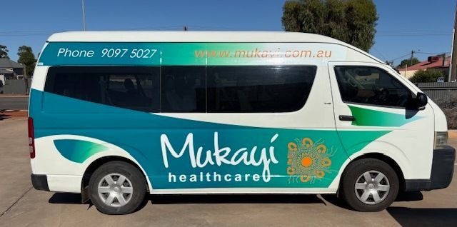 White van with teal and green branding for Mukayi healthcare. Text includes phone and website.