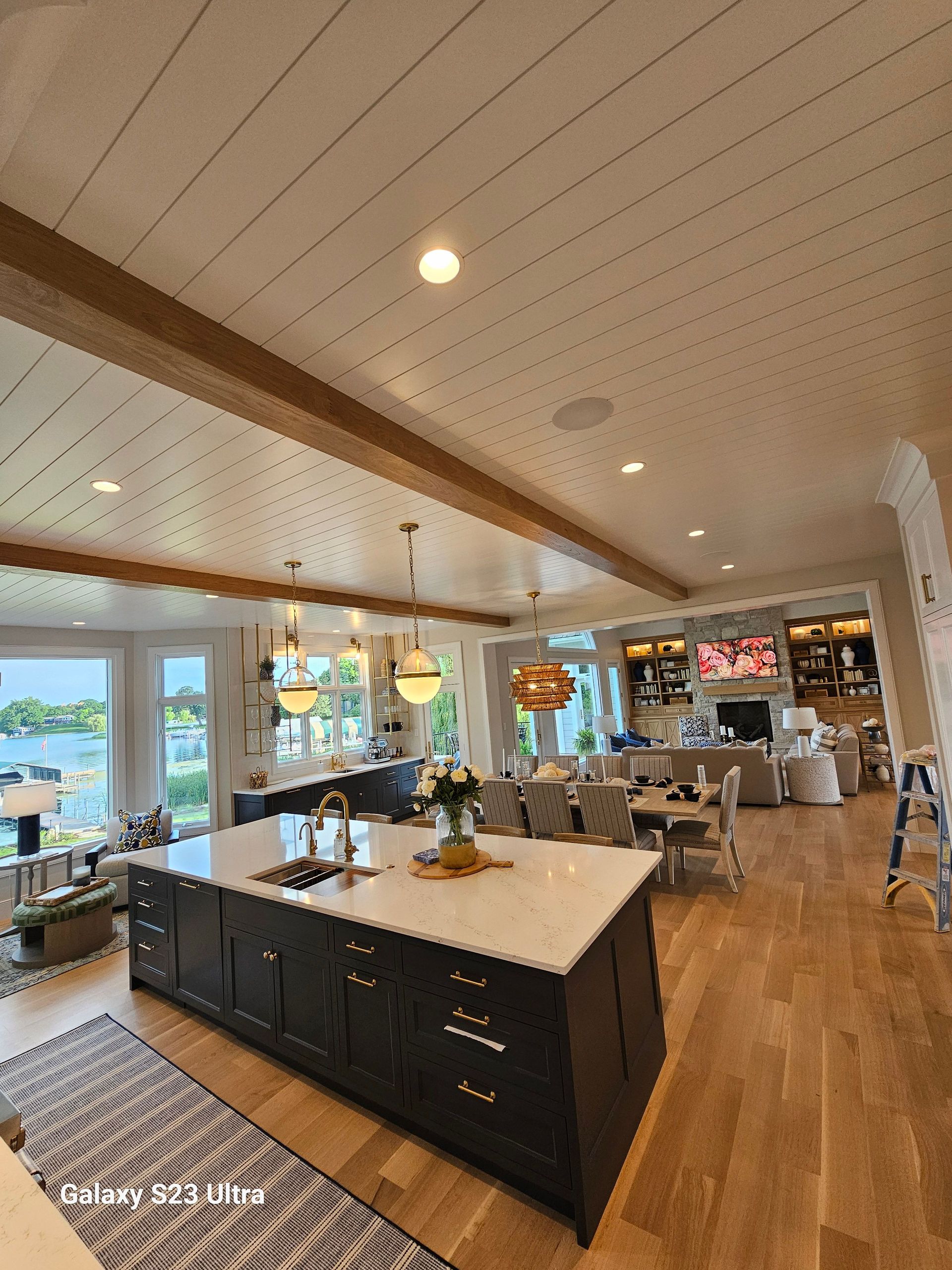 A kitchen with a large island in the middle of it