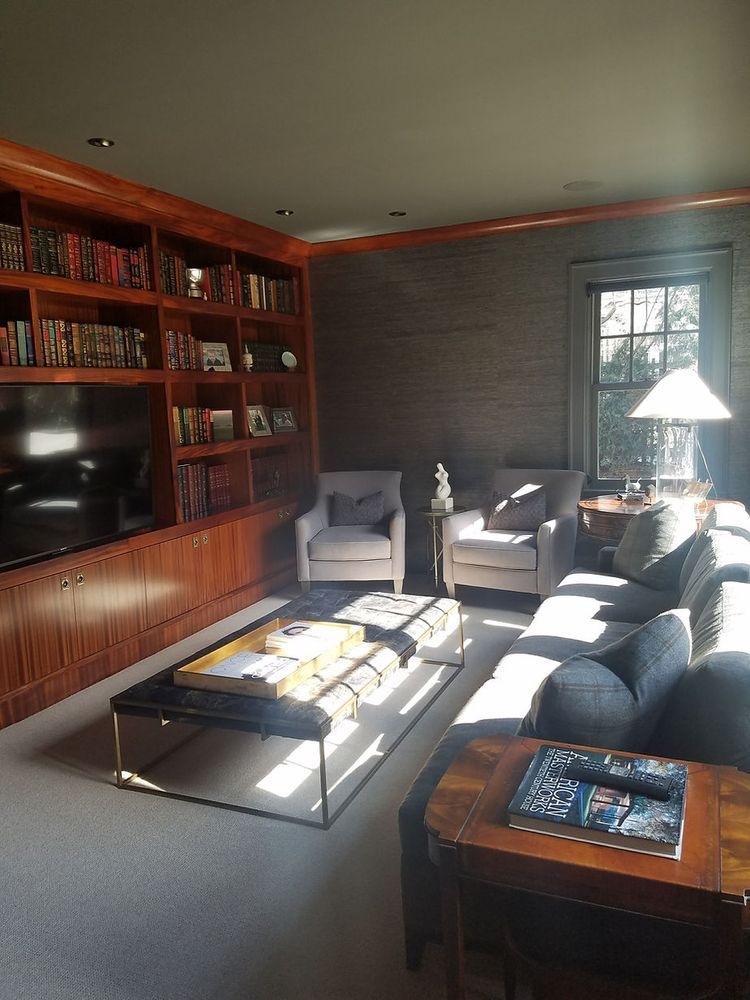 A living room filled with furniture and a flat screen tv