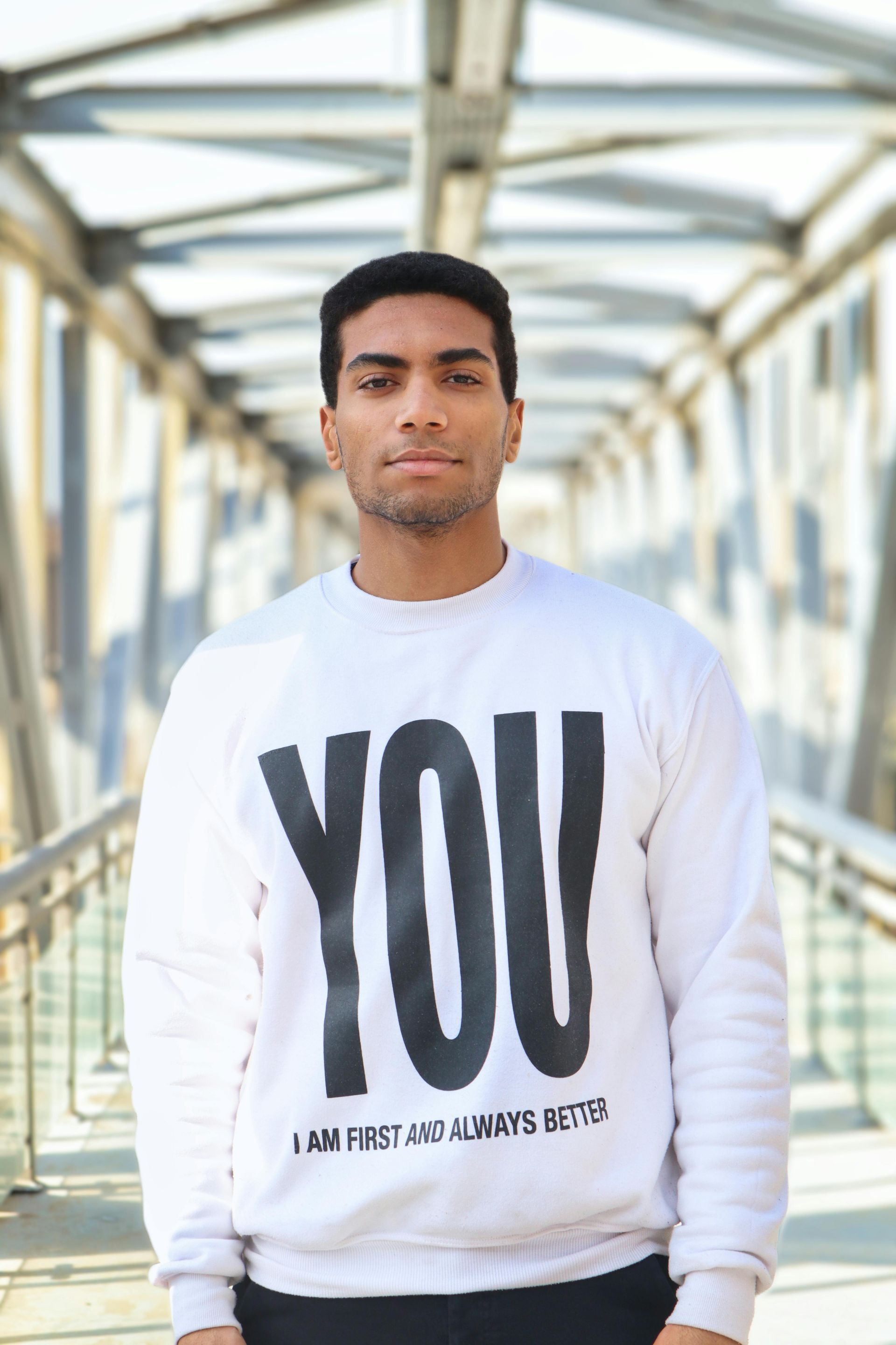 Man in white sweater with