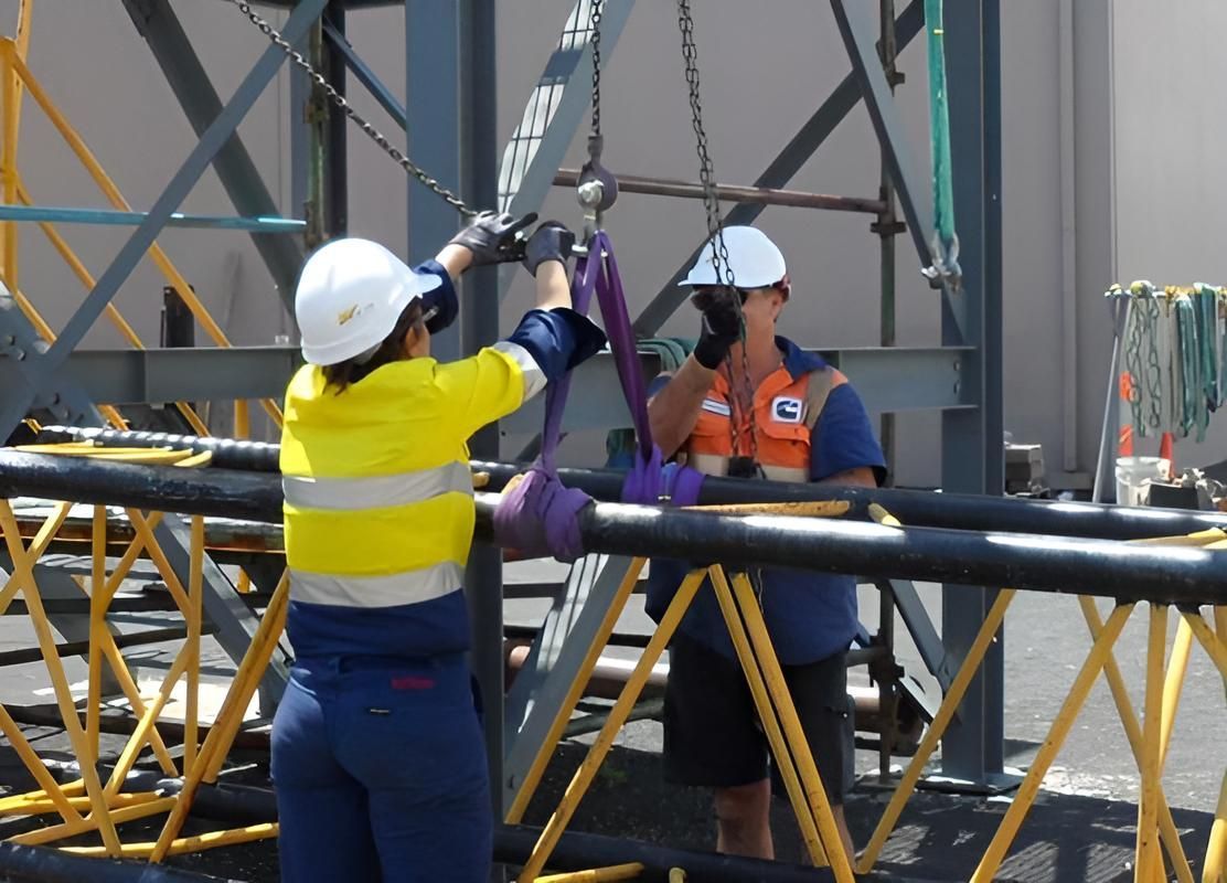Man and a Woman Are Working on a Crane — Advanced Industry Training In South Townsville, QLD