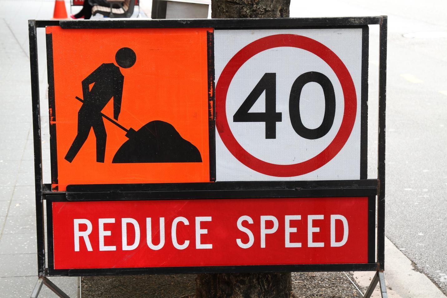 A Sign That Says Reduce Speed on It — Advanced Industry Training In South Townsville, QLD