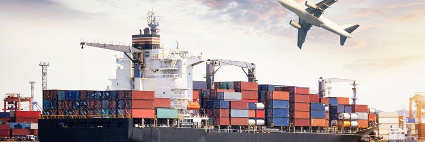 Container ship loaded with shipping containers and an airplane in the sky. Container ship loaded with shipping containers and an airplane in the sky.