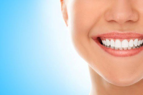 Woman With Clean Teeth — Hummelstown, PA — Conestoga Oral Surgery