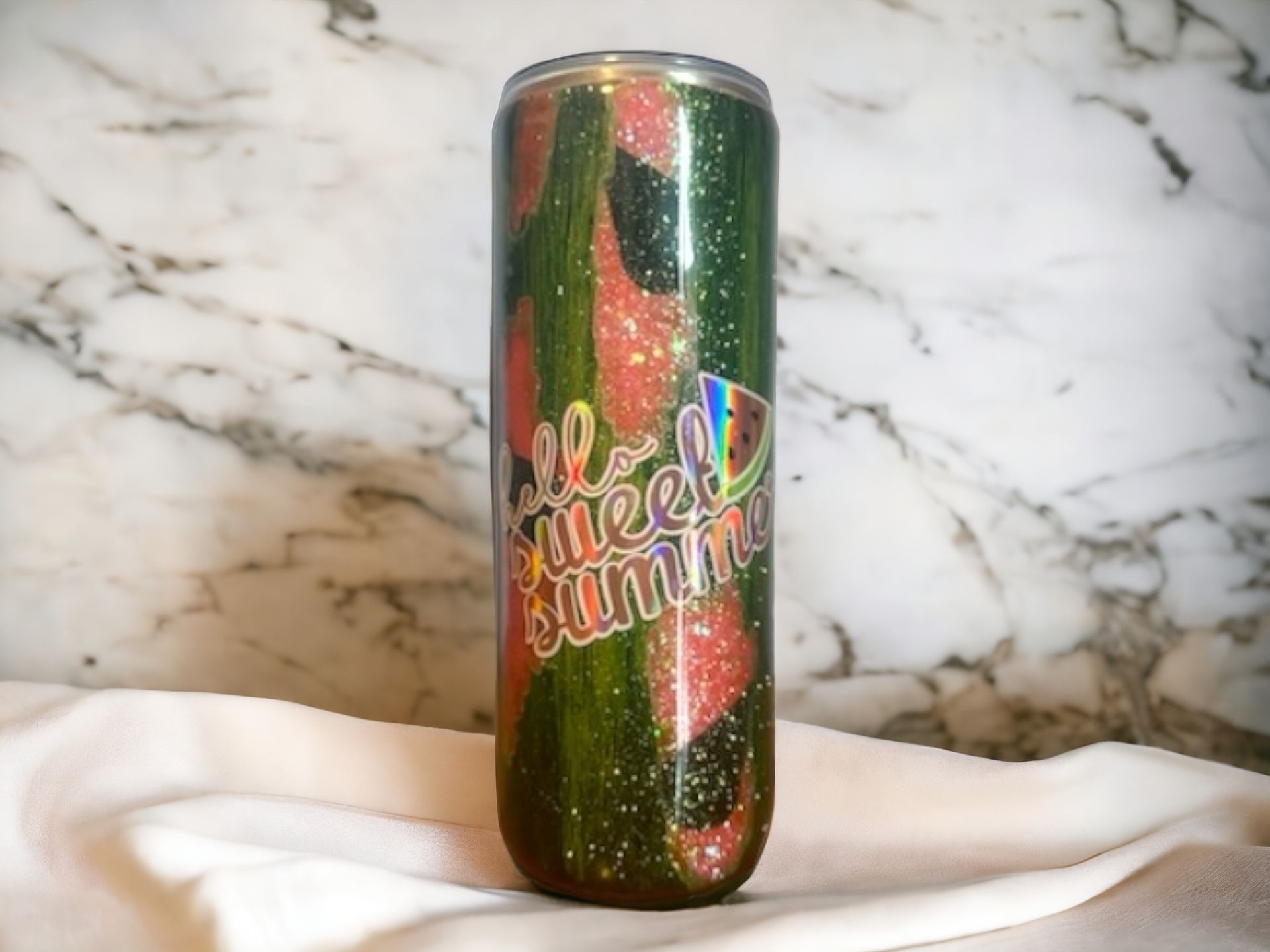 Three glittery watermelon-themed tumblers. Green and red, with a 