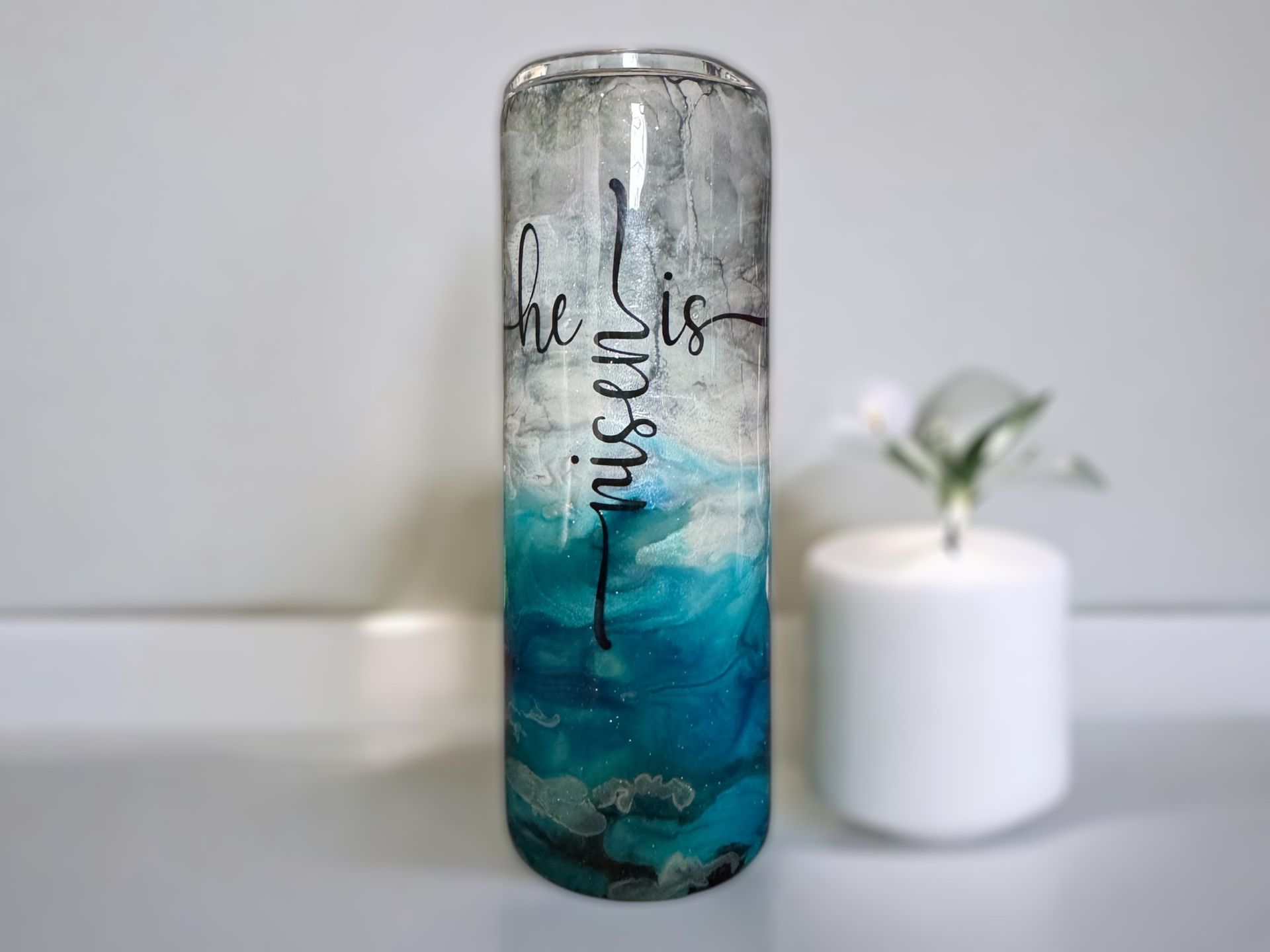 Two glittery tumblers; one says 