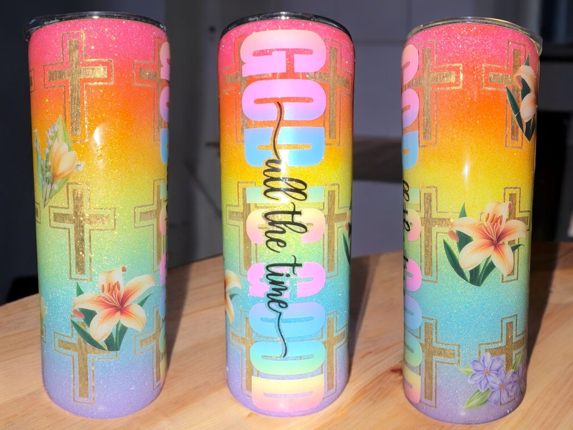 Three glittery tumblers with 