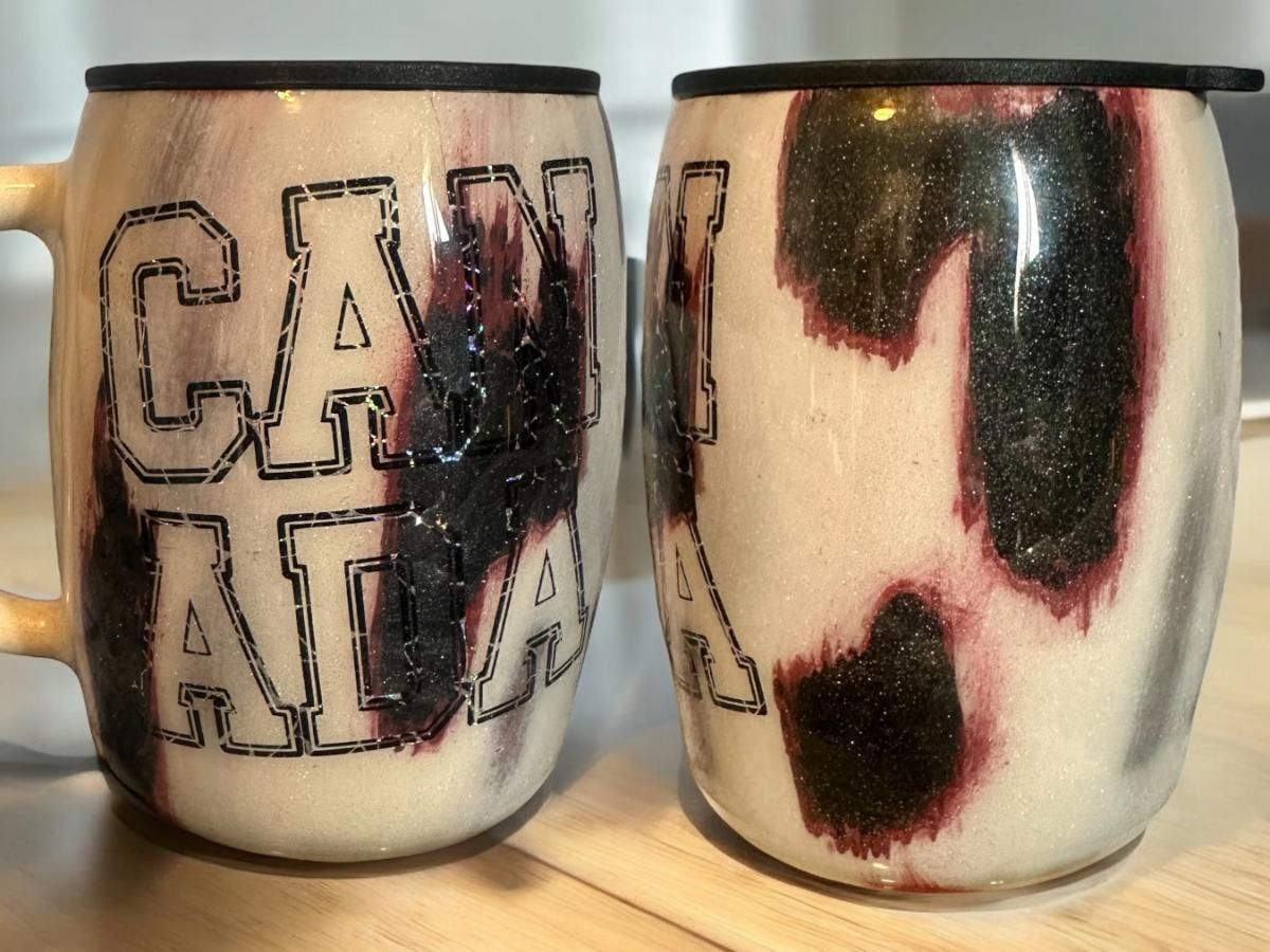 Two ceramic mugs with 