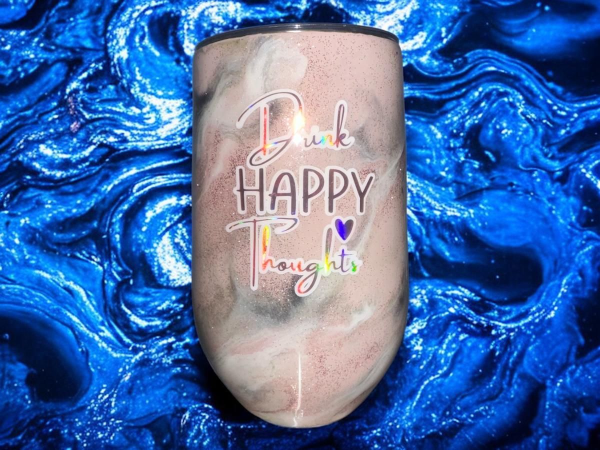 Tumbler with glittery pink, white, and gray swirls, text 