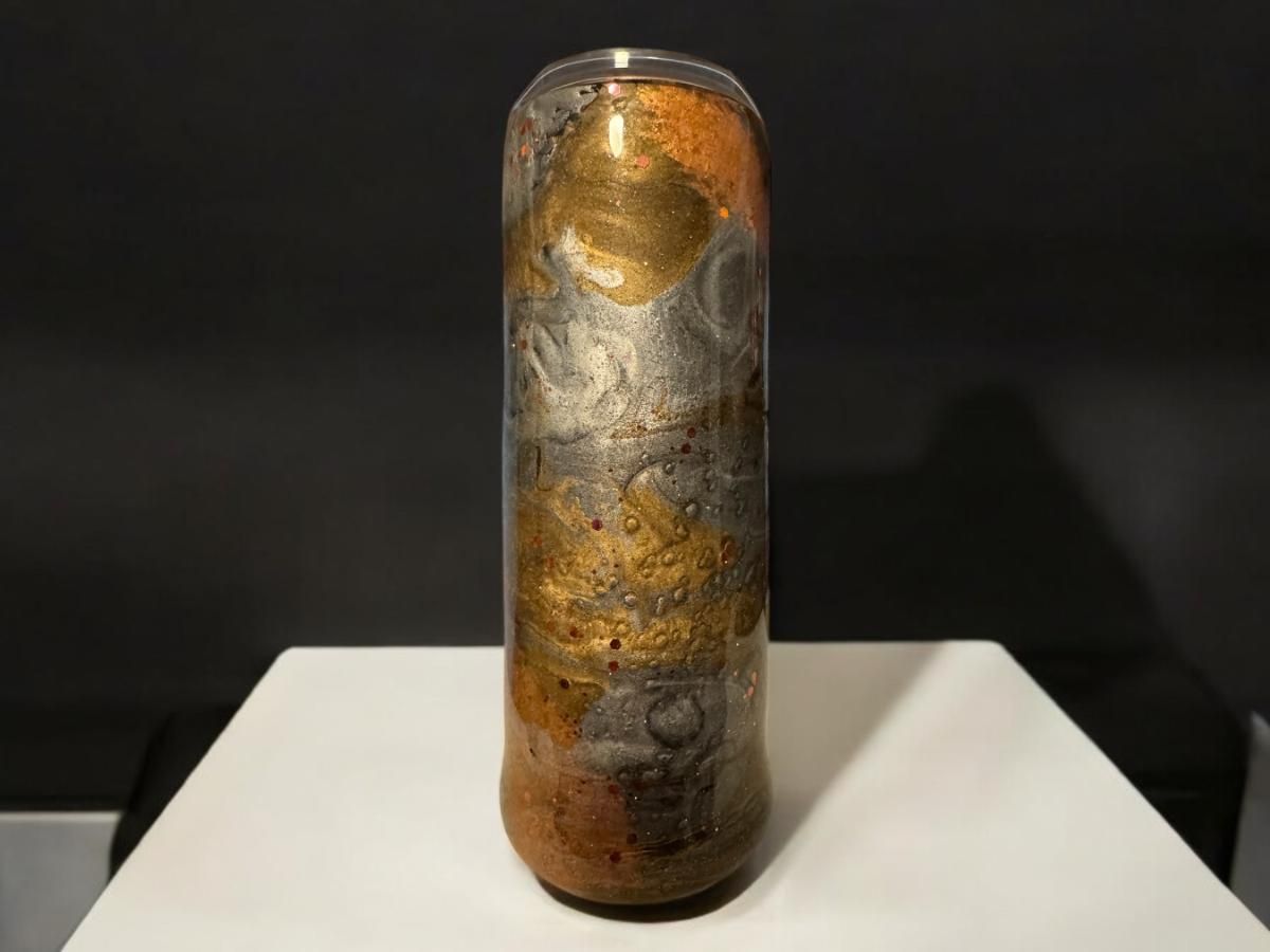 Two tall, decorative tumblers. One features a guitar and floral design. Both have gold, gray, and brown marbled pattern.