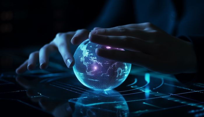 A person is holding a glowing globe in their hand.