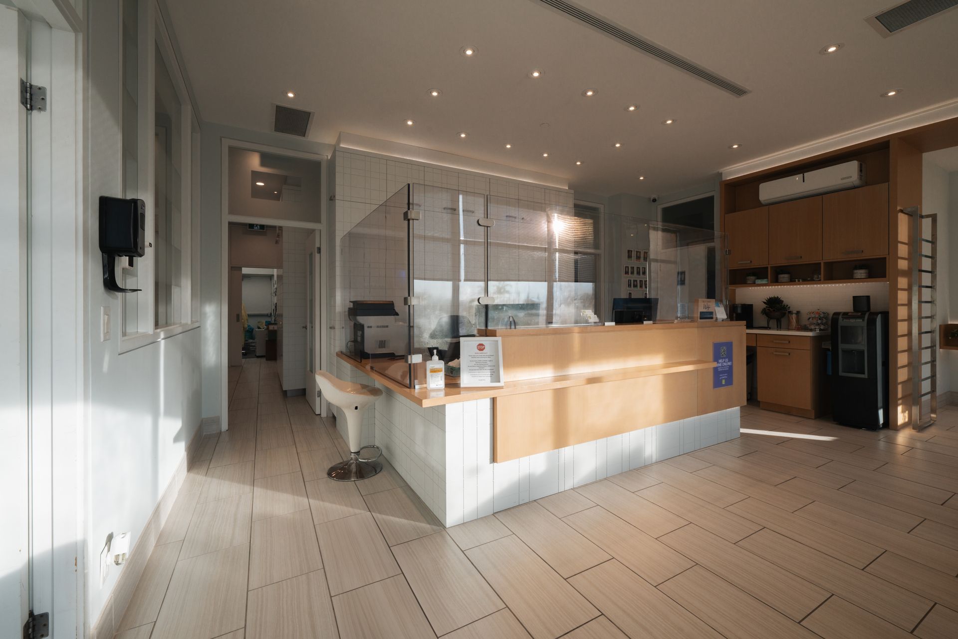 A large room with a counter in the middle of it.