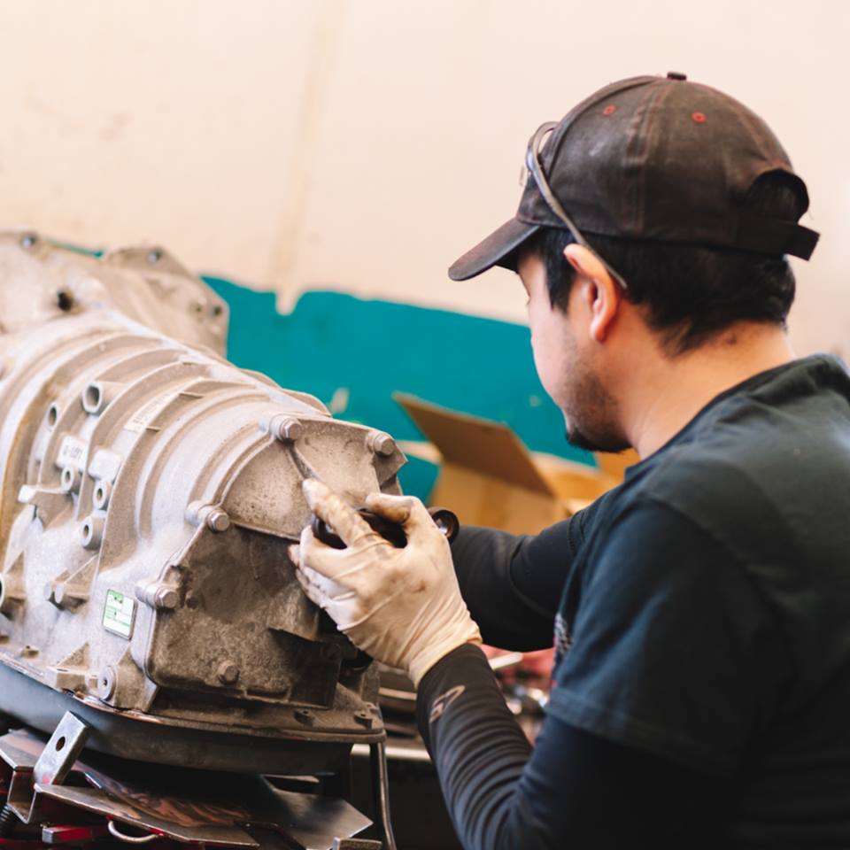 Mechanic Fixing Engine Part — Rolling Meadows, IL — Trans-Fixed