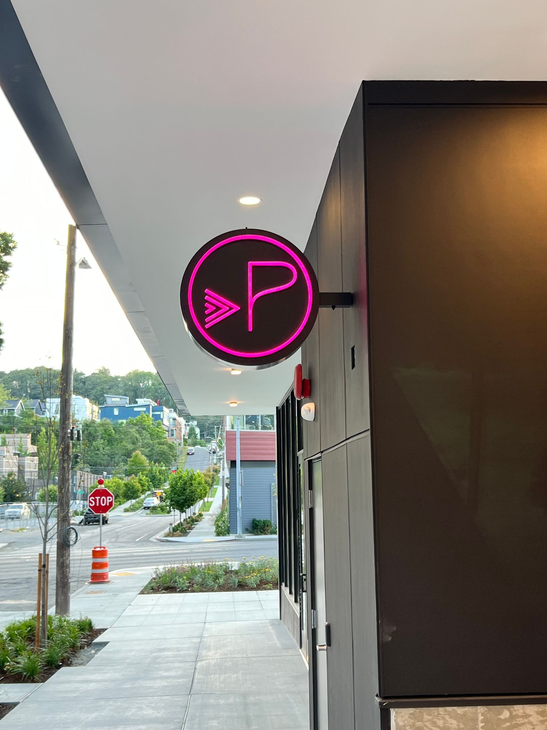 Pink and black sign