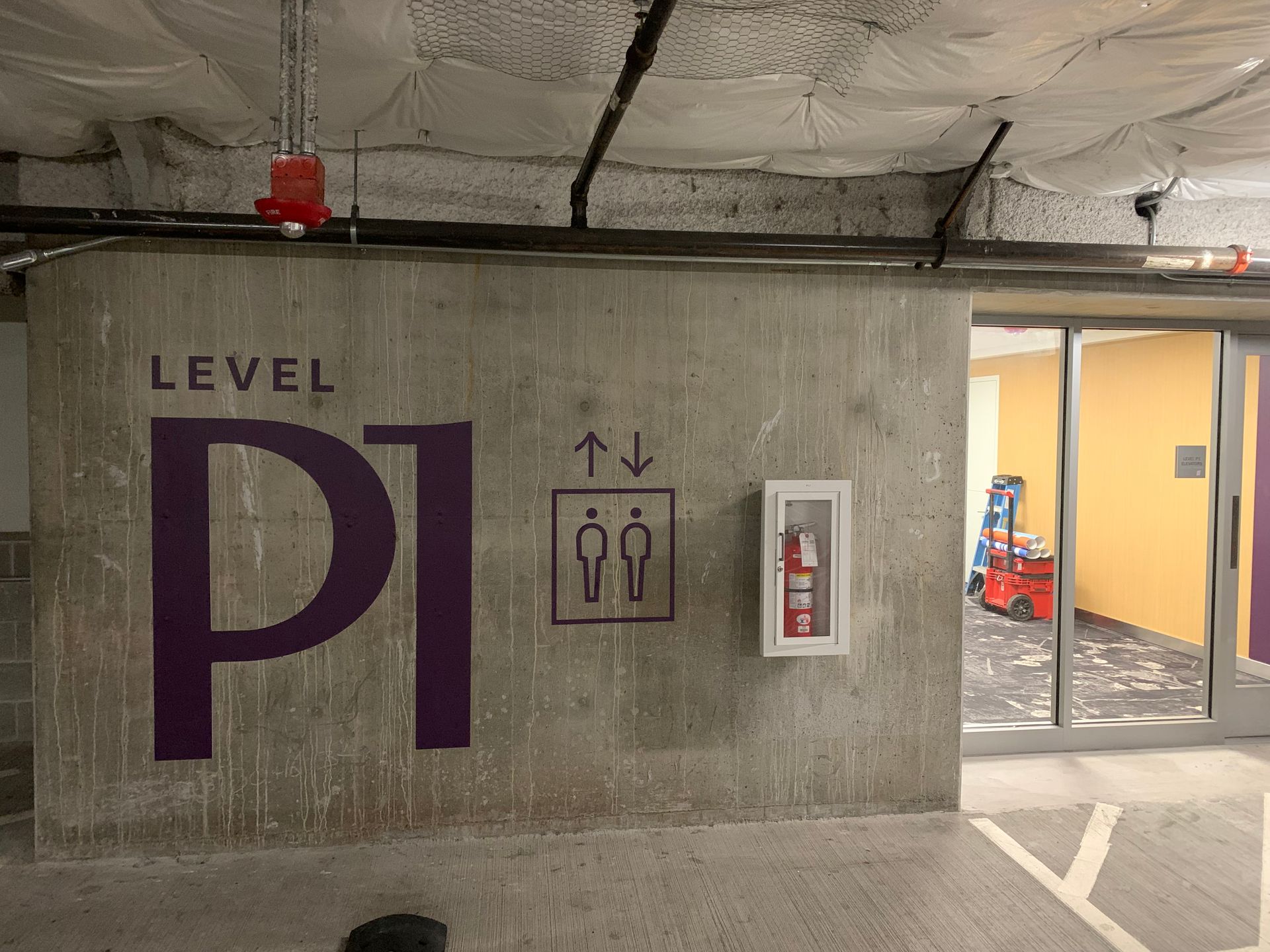 Concrete wall marking parking level