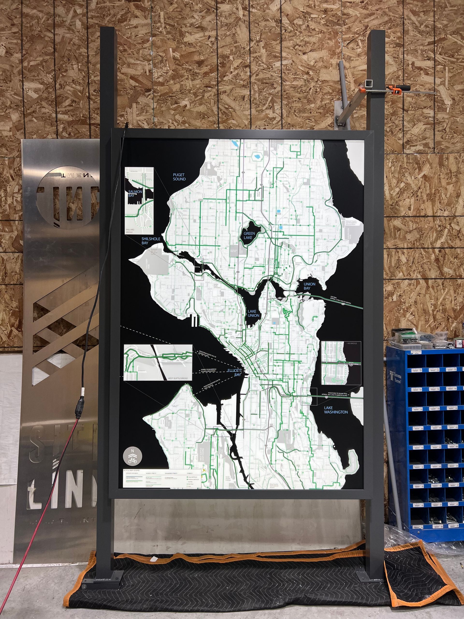 Map of seattle with green lines on a black background