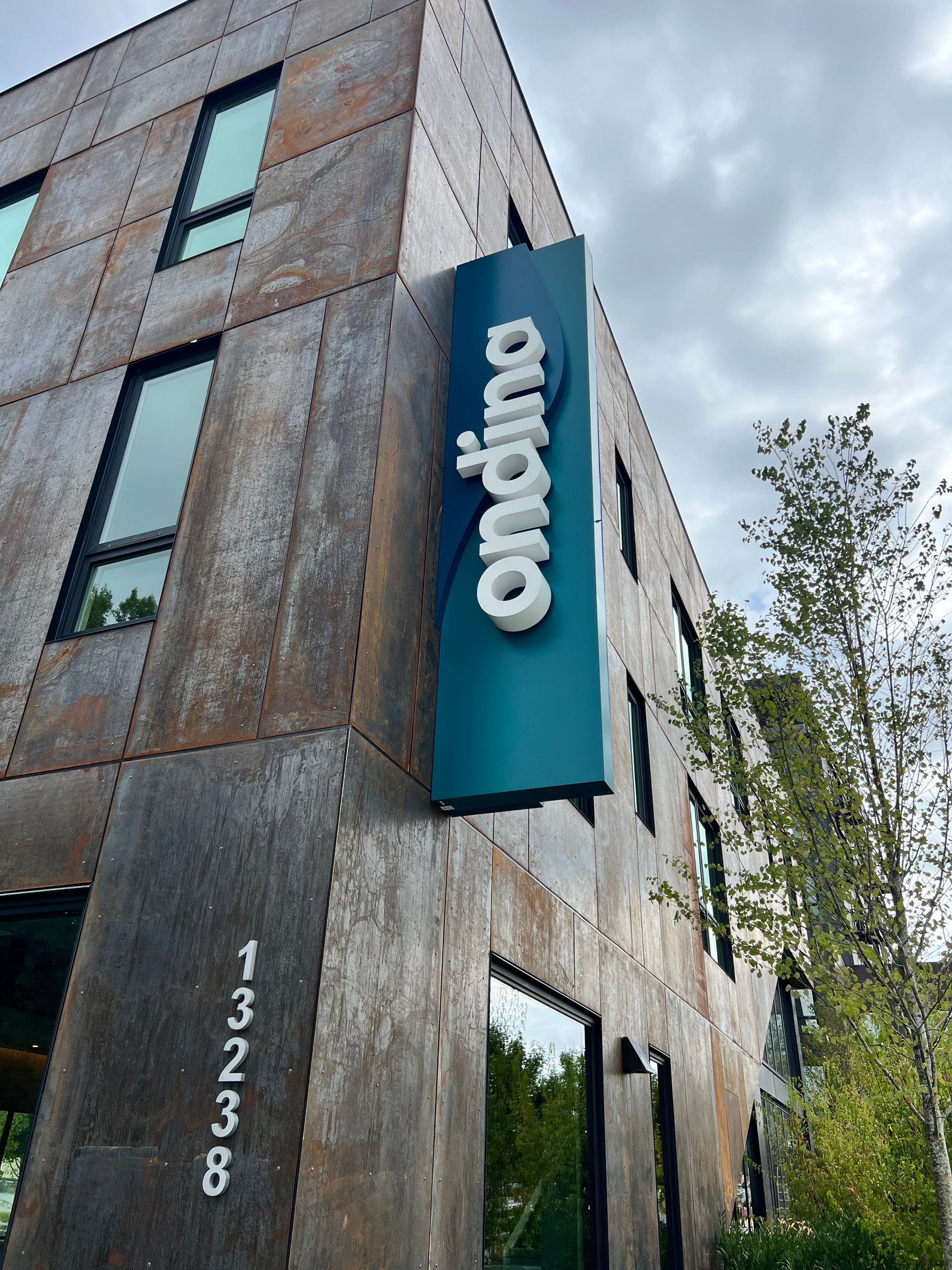 Building exterior with weathered metal panels