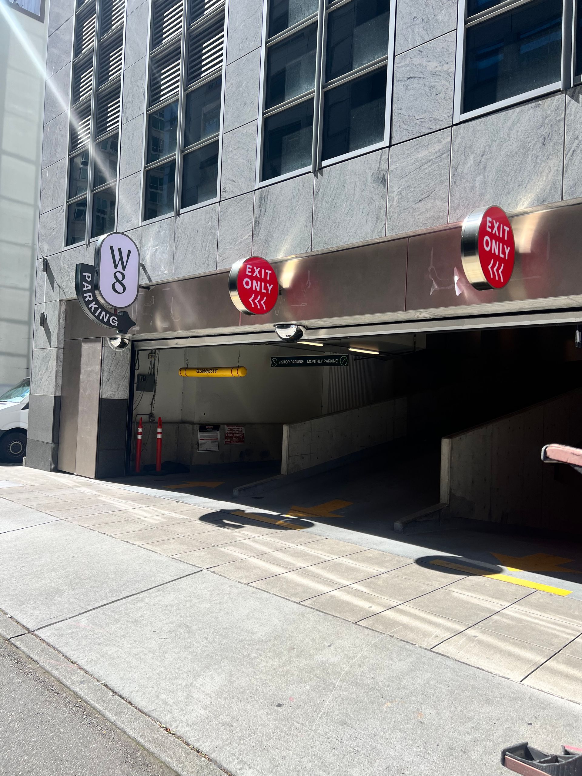 Parking garage entrance with red
