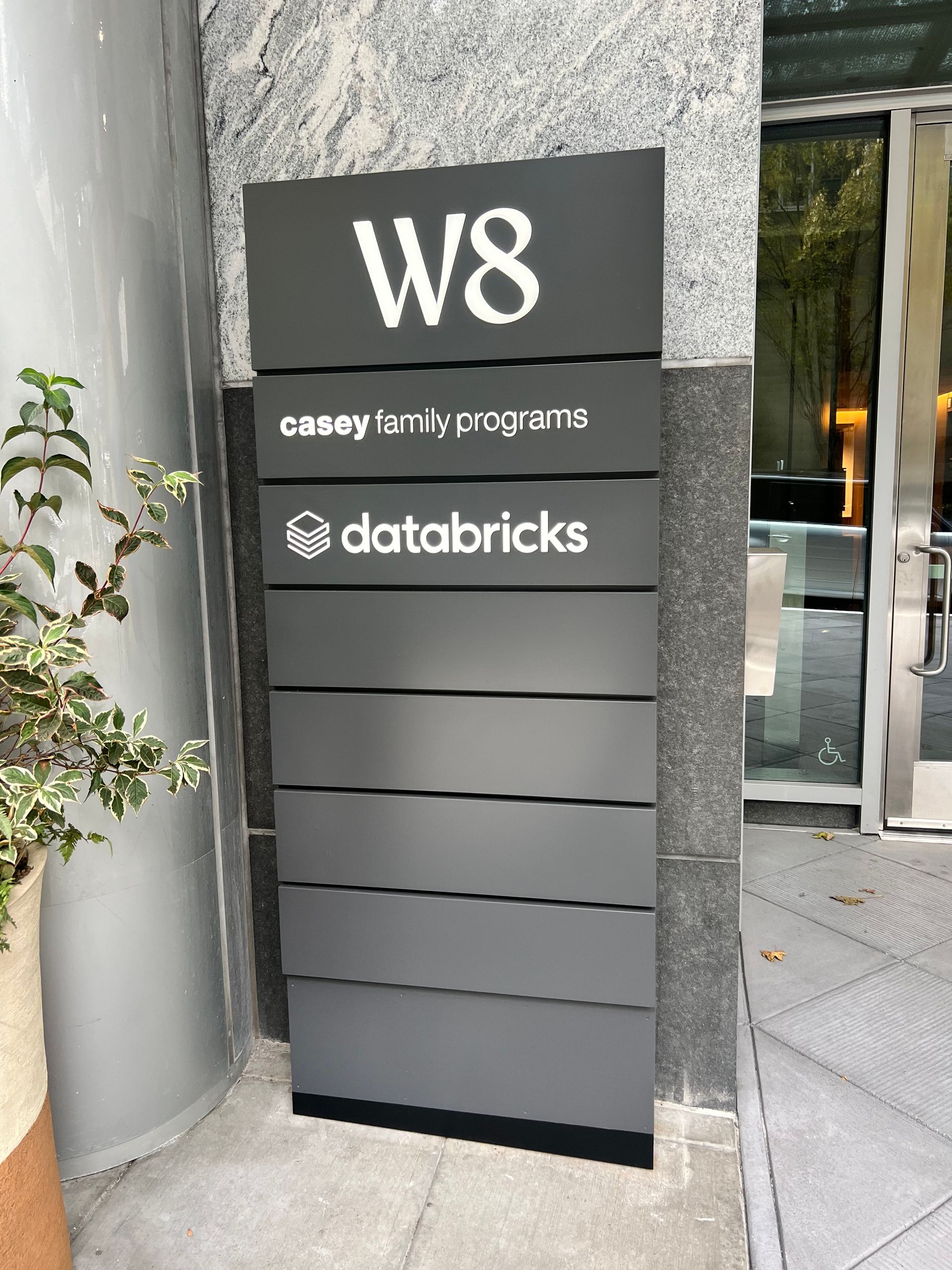 Sign indicating building entrance