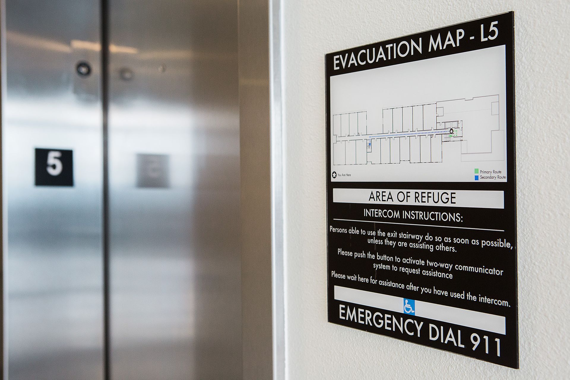 Evacuation map next to elevator