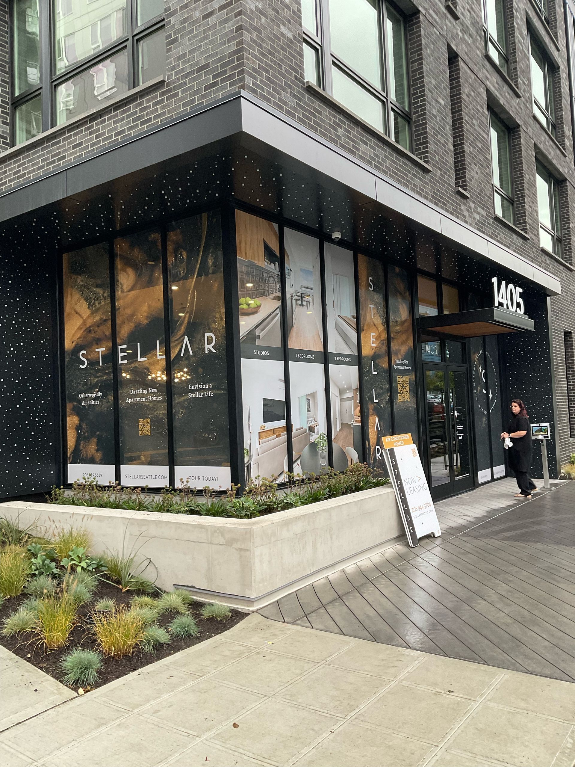 A modern building with large windows and promotional displays